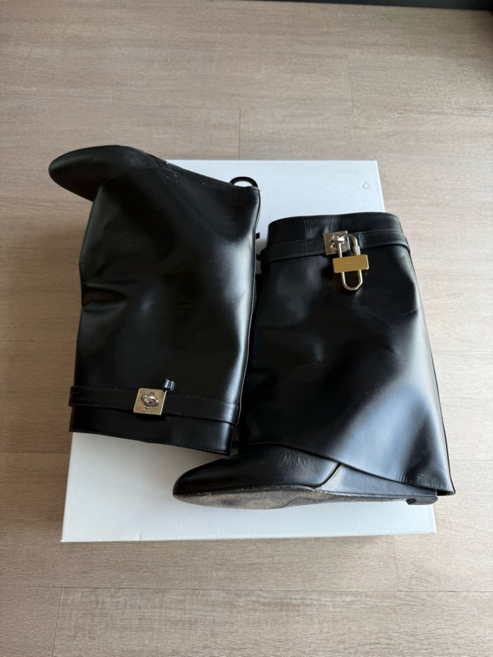 Black Leather Mid-Calf Boots with Gold Hardware
